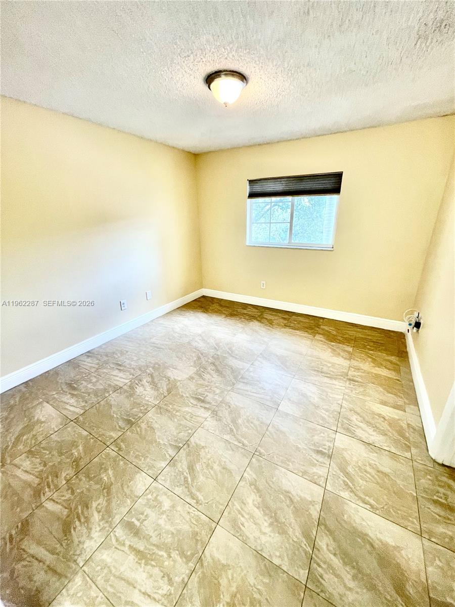 3690 North 56th Avenue, Unit 921 Hollywood, FL 33021 - Photo 35 of 41 a view of a big room with wooden floor