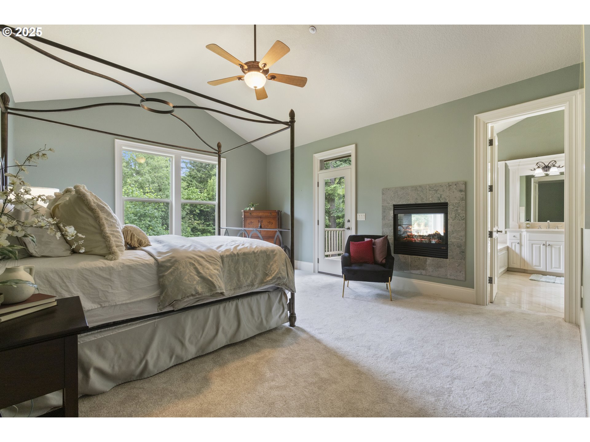 24800 Southwest Big Fir Road West Linn, OR 97068 - Photo 19 of 48 a living room with a bed furniture and a large window