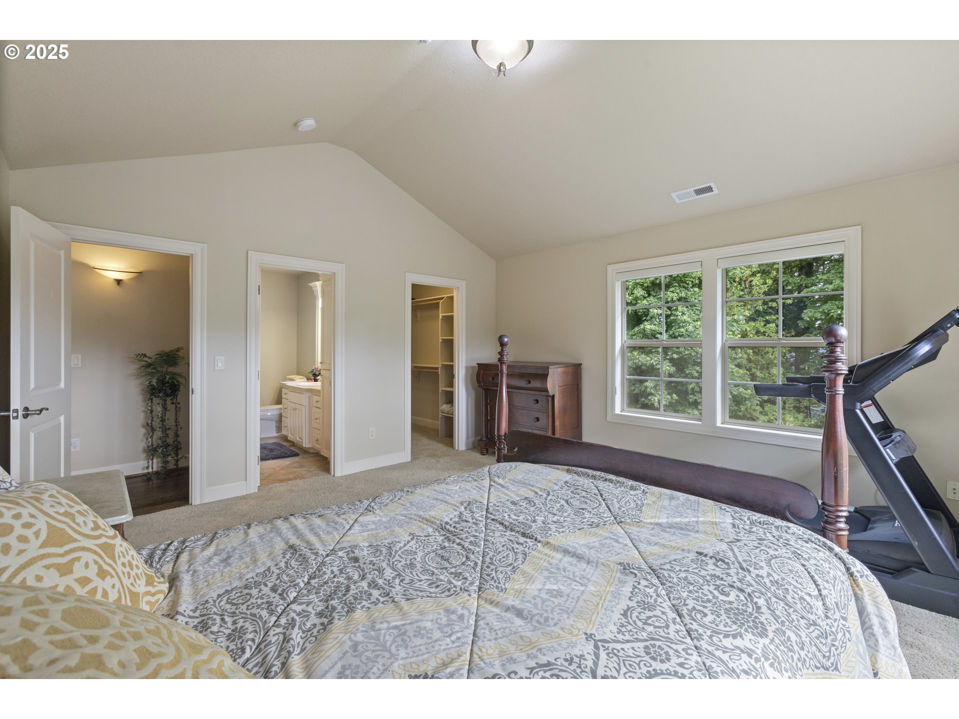 24800 Southwest Big Fir Road West Linn, OR 97068 - Photo 27 of 48 a bedroom with a bed and a large window