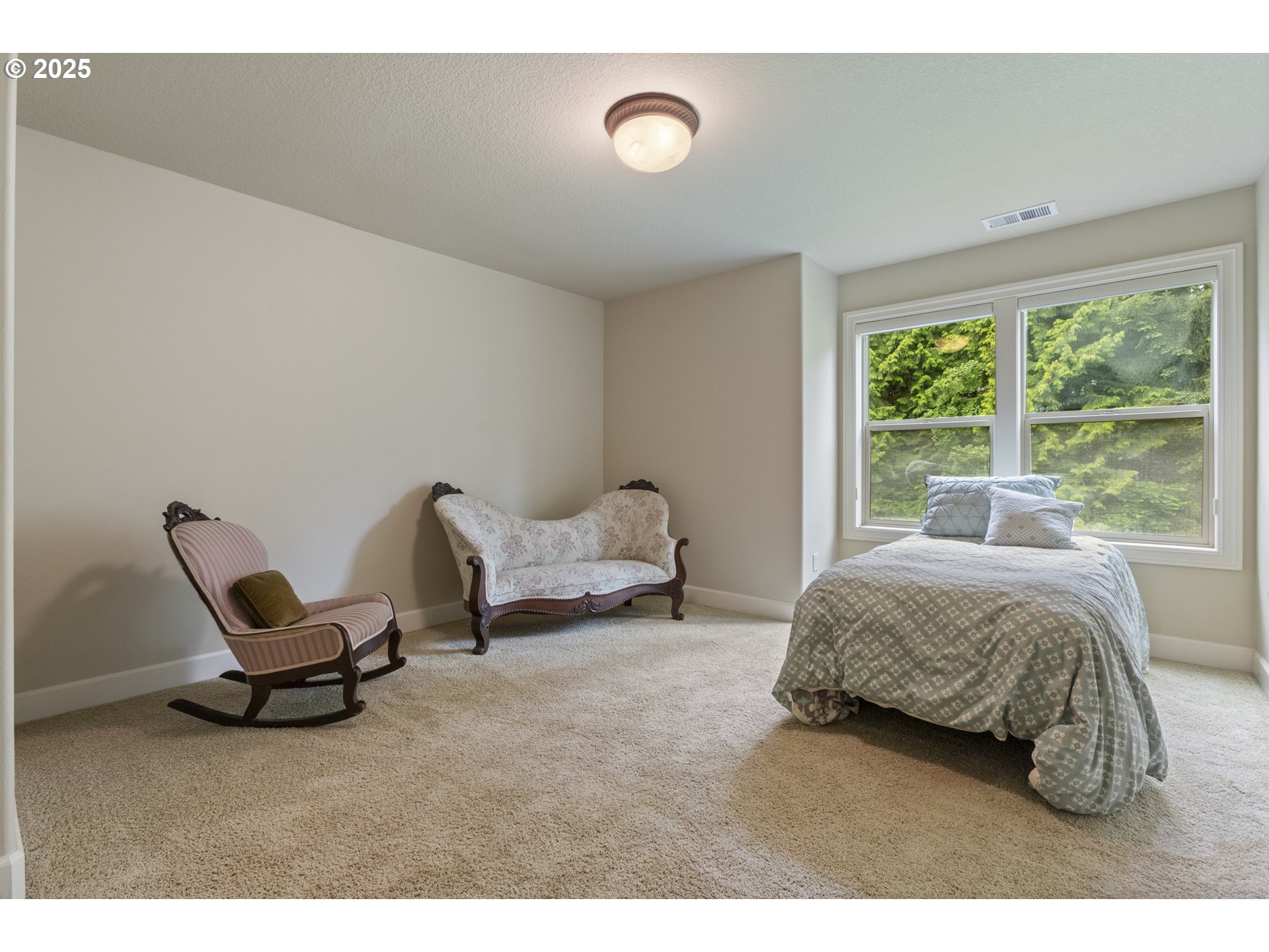 24800 Southwest Big Fir Road West Linn, OR 97068 - Photo 29 of 48 a living room with furniture and a window