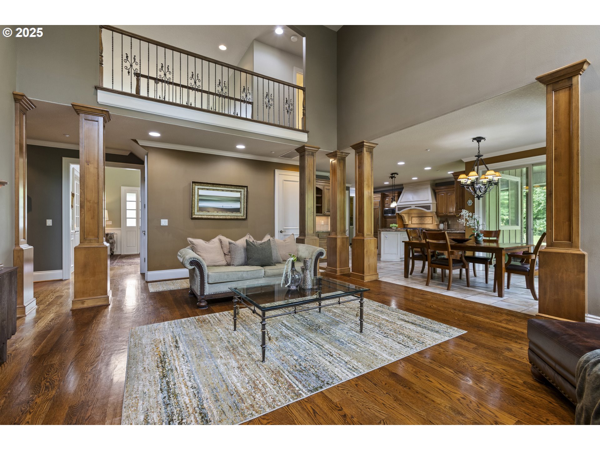 24800 Southwest Big Fir Road West Linn, OR 97068 - Photo 6 of 48 a living room with furniture and wooden floor