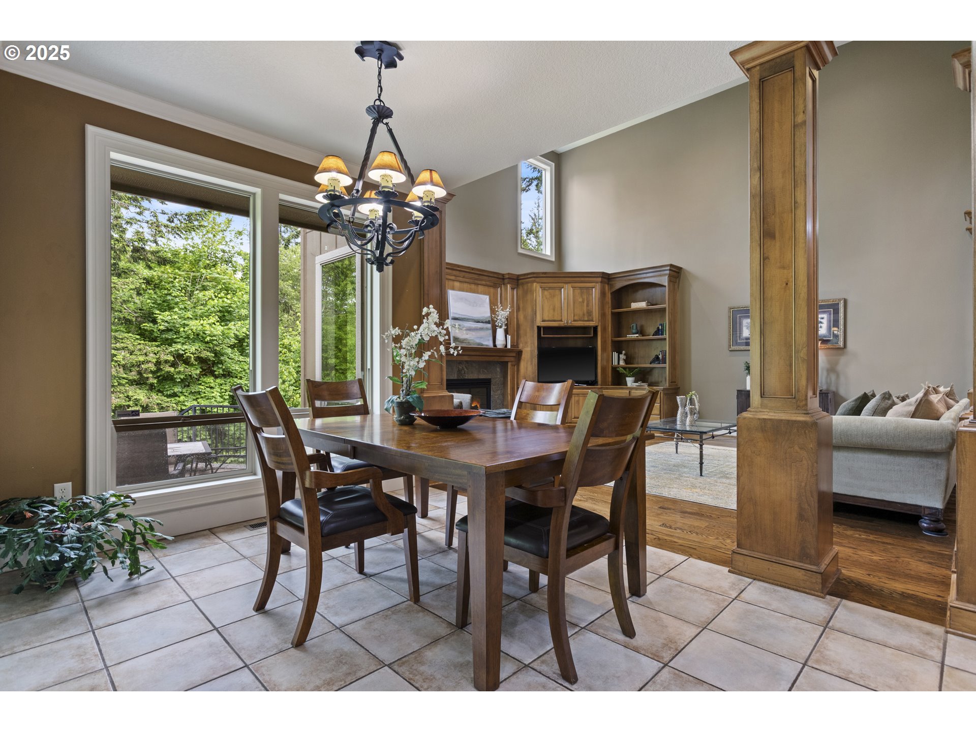 24800 Southwest Big Fir Road West Linn, OR 97068 - Photo 7 of 48 a view of a dining room with furniture window and wooden floor