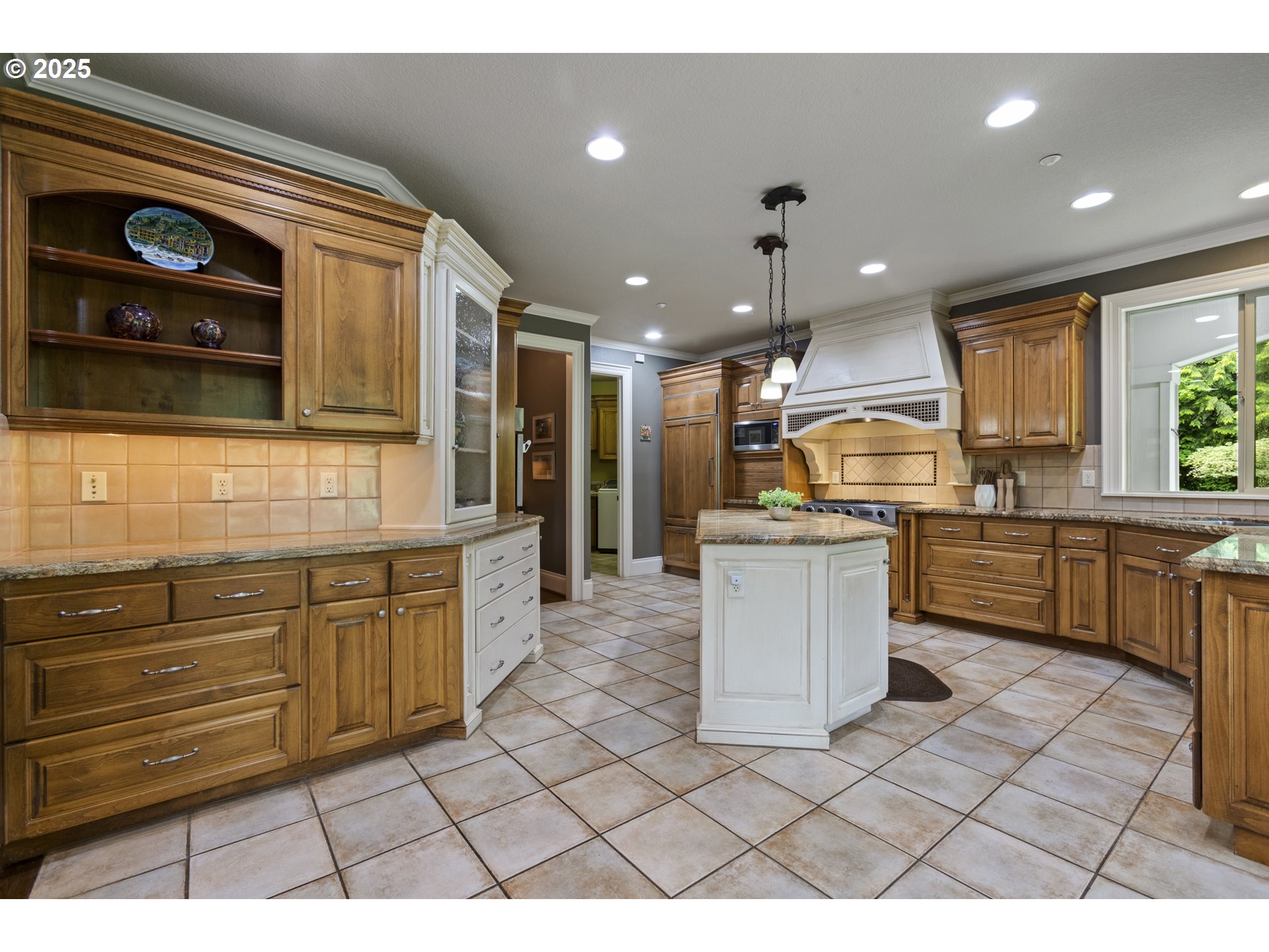 24800 Southwest Big Fir Road West Linn, OR 97068 - Photo 8 of 48 a kitchen with a sink cabinets and window