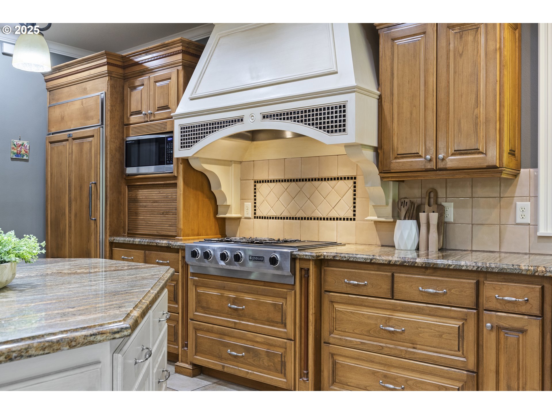 24800 Southwest Big Fir Road West Linn, OR 97068 - Photo 10 of 48 a kitchen with granite countertop a sink a stove and cabinets