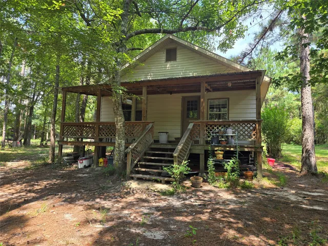 a front view of a house with yard