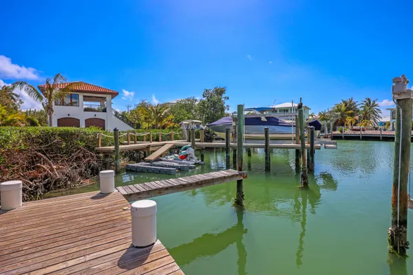a view of a balcony with chairs