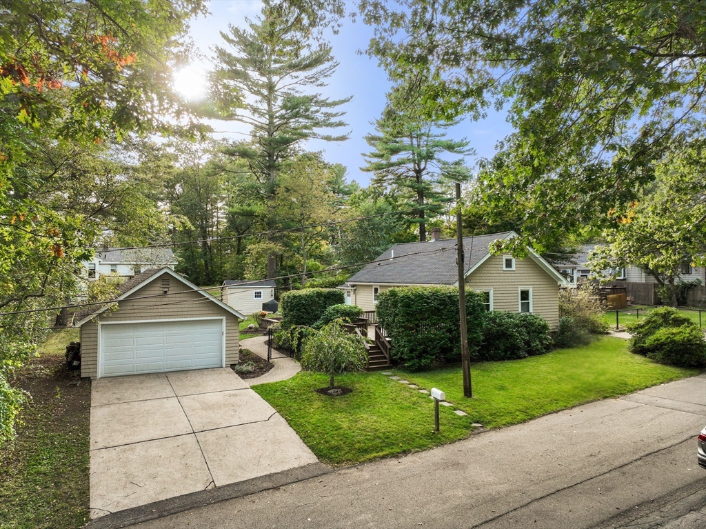 6 Grove Avenue Sharon, MA 02067 - Photo 1 of 27 a front view of house with yard and green space