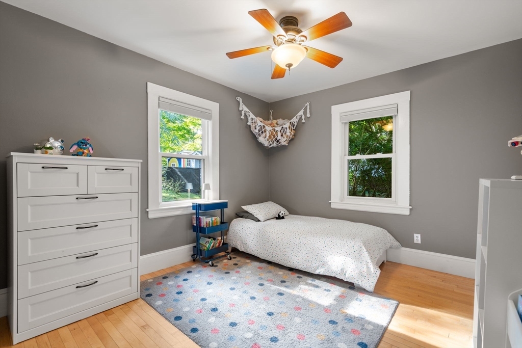 6 Grove Avenue Sharon, MA 02067 - Photo 14 of 27 a bedroom with a bed and a window