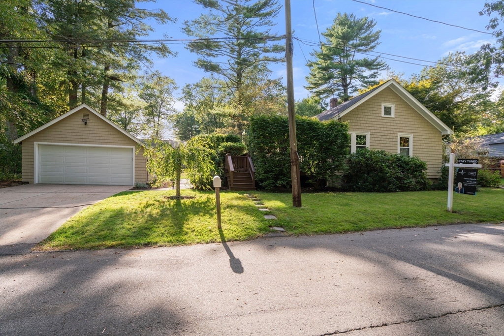 6 Grove Avenue Sharon, MA 02067 - Photo 26 of 27 a house view with a garden space