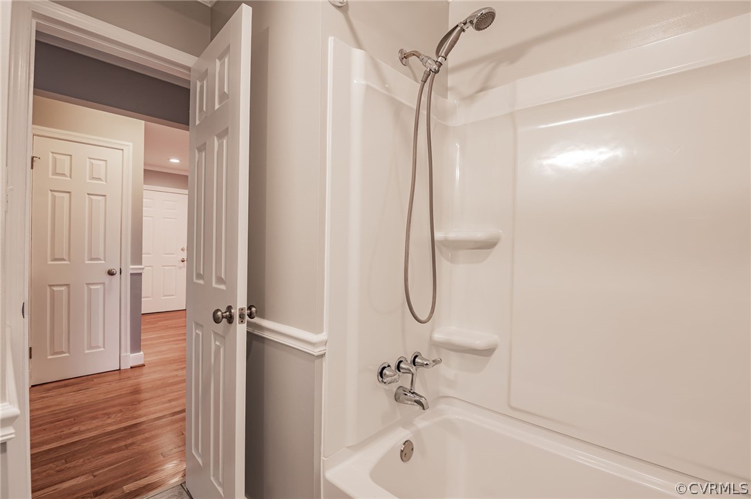 3825 West Hundred Road Chester, VA 23831 - Photo 19 of 30 a bathroom with a shower and a bathtub