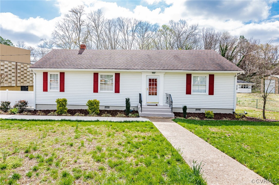 3825 West Hundred Road Chester, VA 23831 - Photo 2 of 30 a front view of house with yard and trees in the background