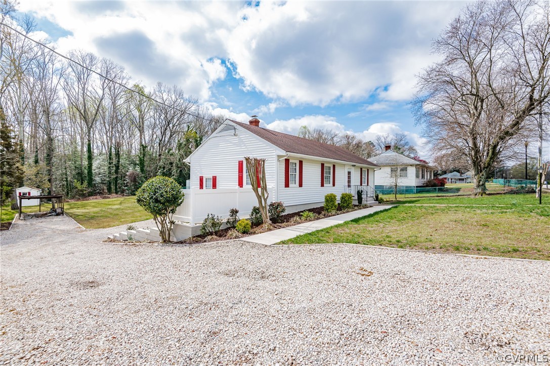 3825 West Hundred Road Chester, VA 23831 - Photo 3 of 30 a view of house with yard and entertaining space