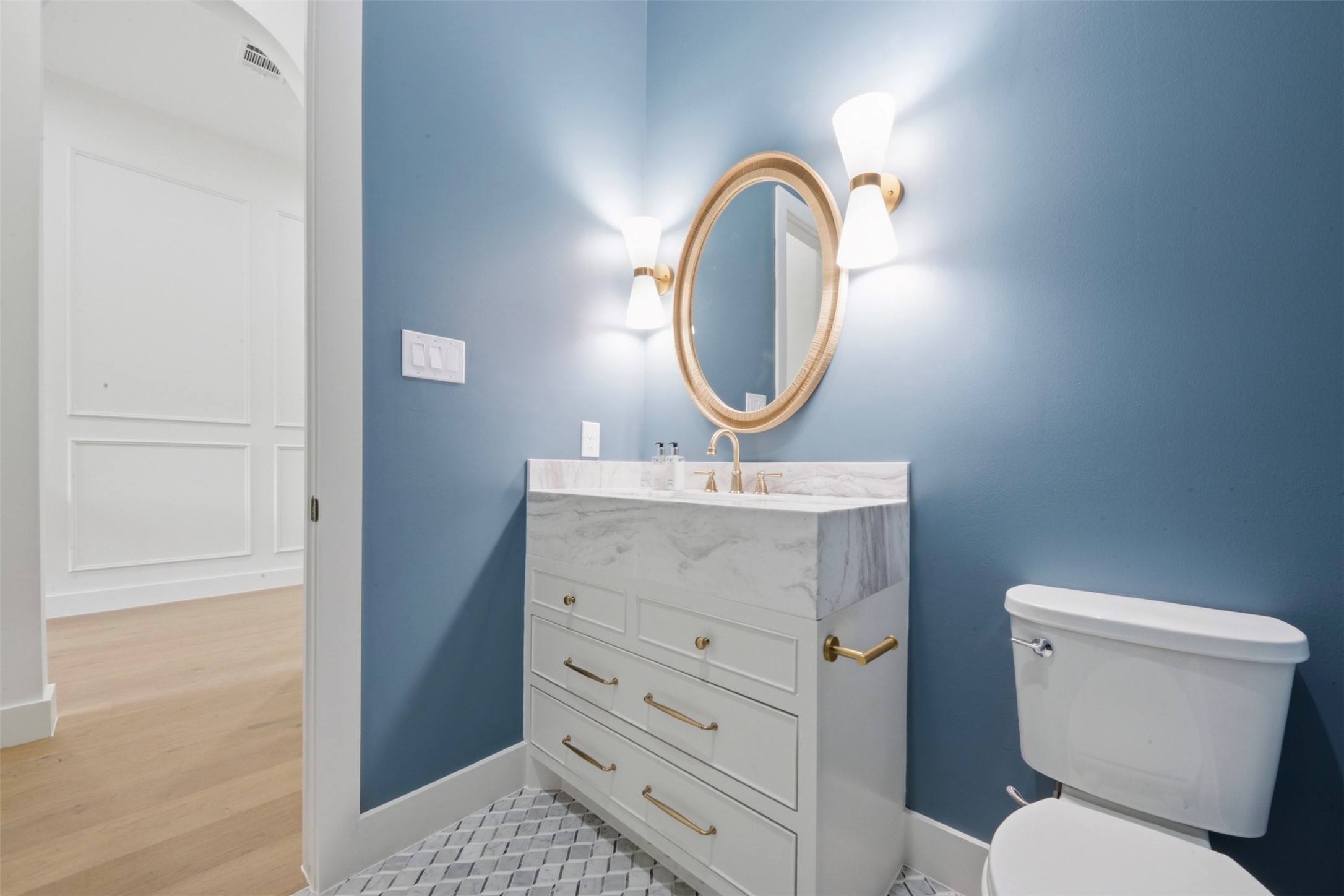 2325 Wroxton Road Houston, TX 77005 - Photo 8 of 31 Powder Bath with Marble Mosaic Flooring and Counter Tops