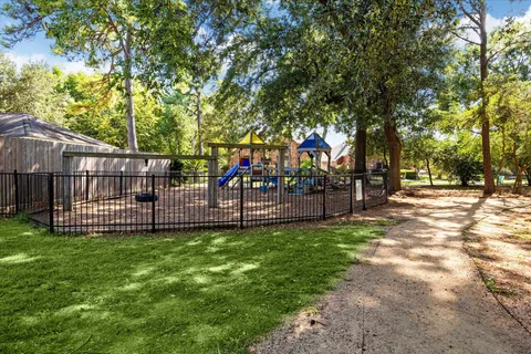 a view of a lake with a yard