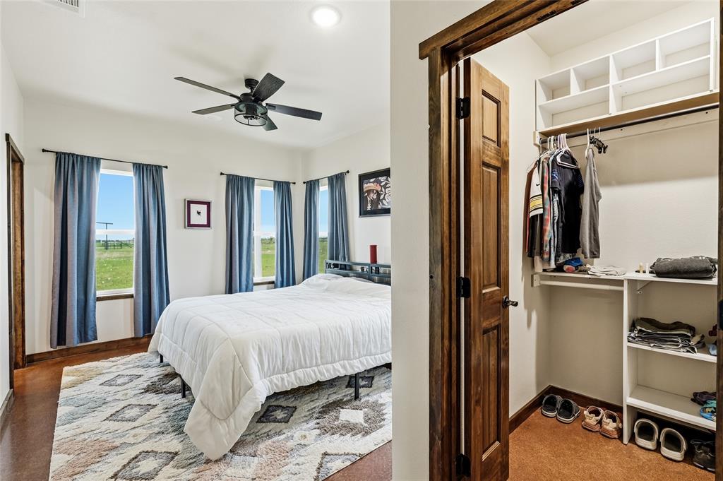 435 County Road 4875 Celeste, TX 75423 - Photo 15 of 35 a bedroom with a bed and a window