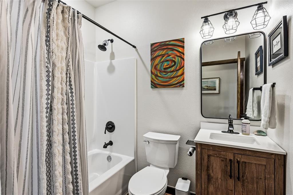 435 County Road 4875 Celeste, TX 75423 - Photo 22 of 35 a bathroom with a sink and a mirror
