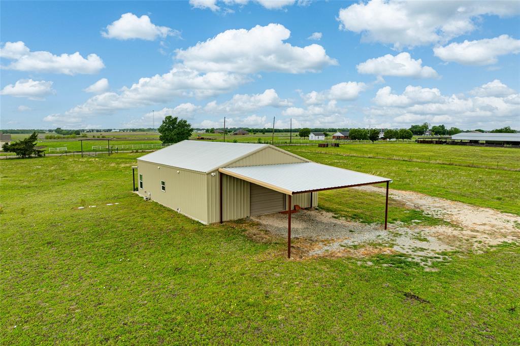 435 County Road 4875 Celeste, TX 75423 - Photo 4 of 35 a house view with a garden space