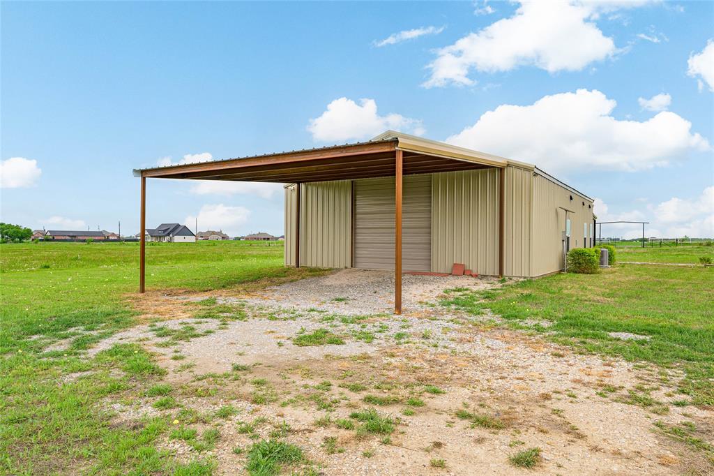 435 County Road 4875 Celeste, TX 75423 - Photo 5 of 35 a backyard of a house with table and chairs