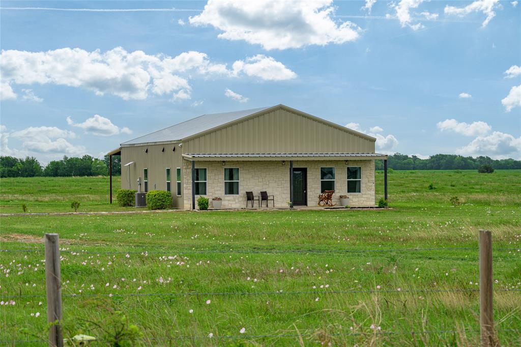 435 County Road 4875 Celeste, TX 75423 - Photo 6 of 35 a front view of a house with garden