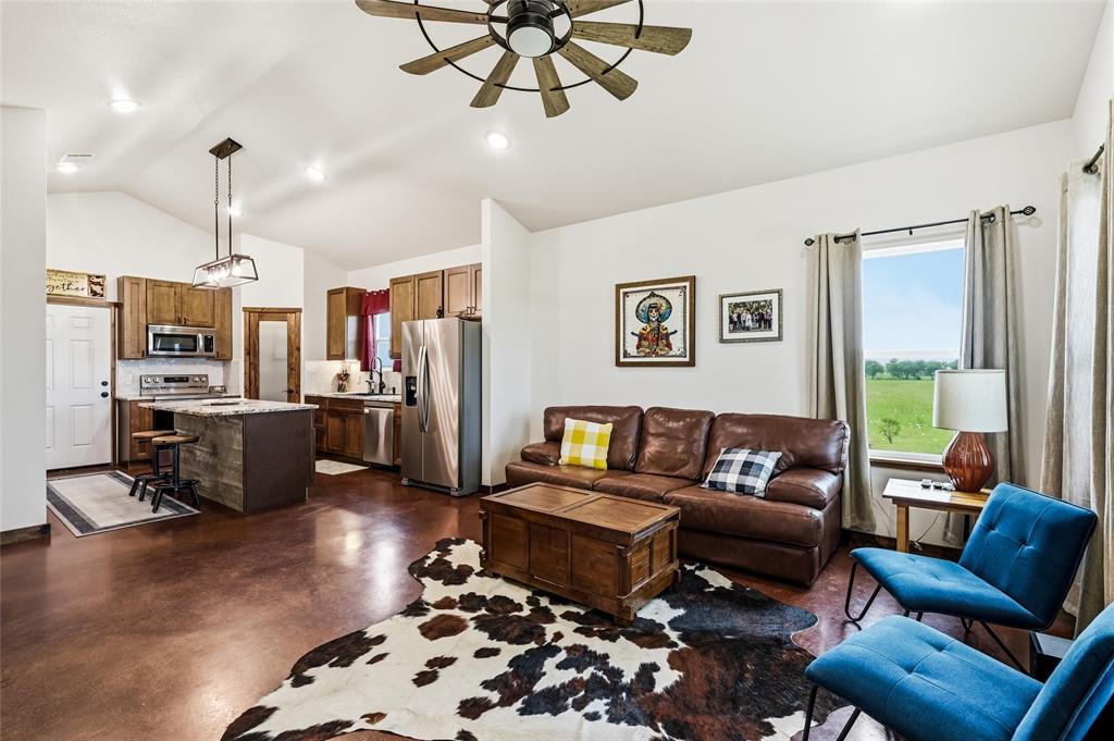 435 County Road 4875 Celeste, TX 75423 - Photo 9 of 35 a living room with furniture kitchen view and a window