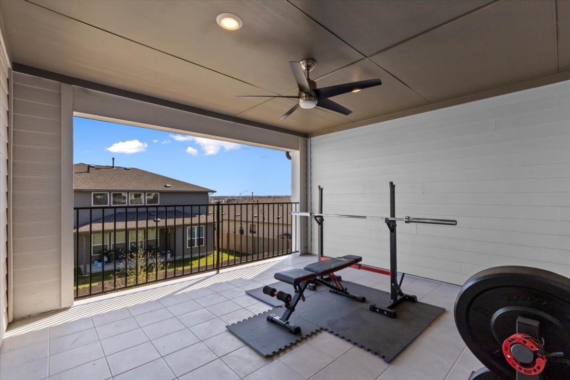 7701 Ellas Inlt Drive Austin, TX 78744 - Photo 15 of 27 a view of a room with gym equipment