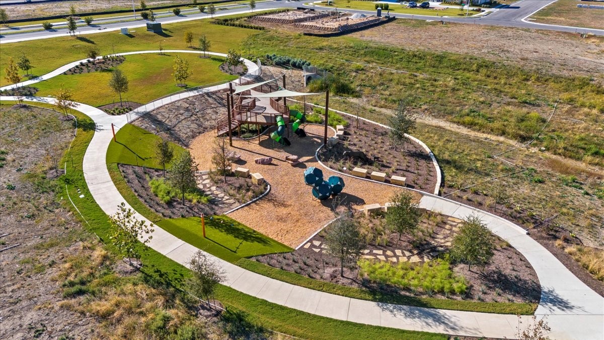 7701 Ellas Inlt Drive Austin, TX 78744 - Photo 26 of 27 a view of a swimming pool with a patio