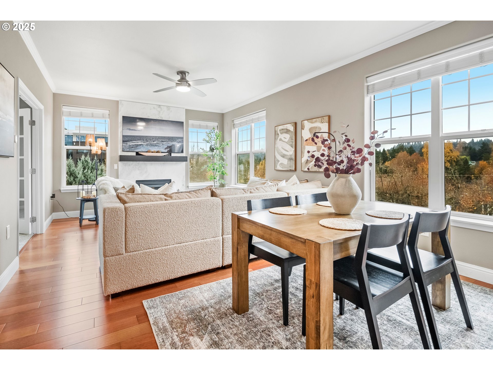 975 Springtree Lane West Linn, OR 97068 - Photo 15 of 48 a view of a dining room with furniture window and wooden floor