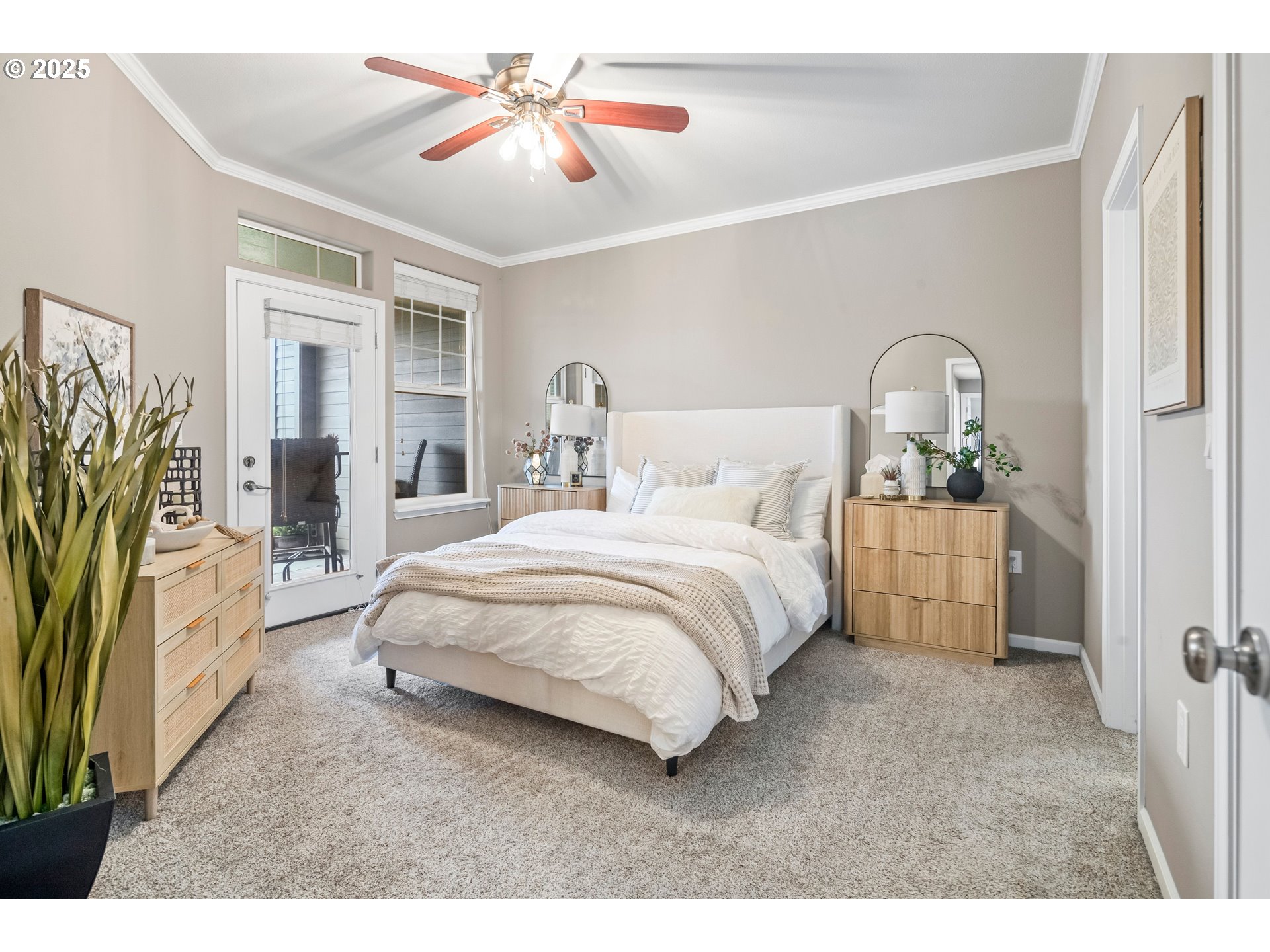 975 Springtree Lane West Linn, OR 97068 - Photo 20 of 48 a spacious bedroom with a bed and a chandelier