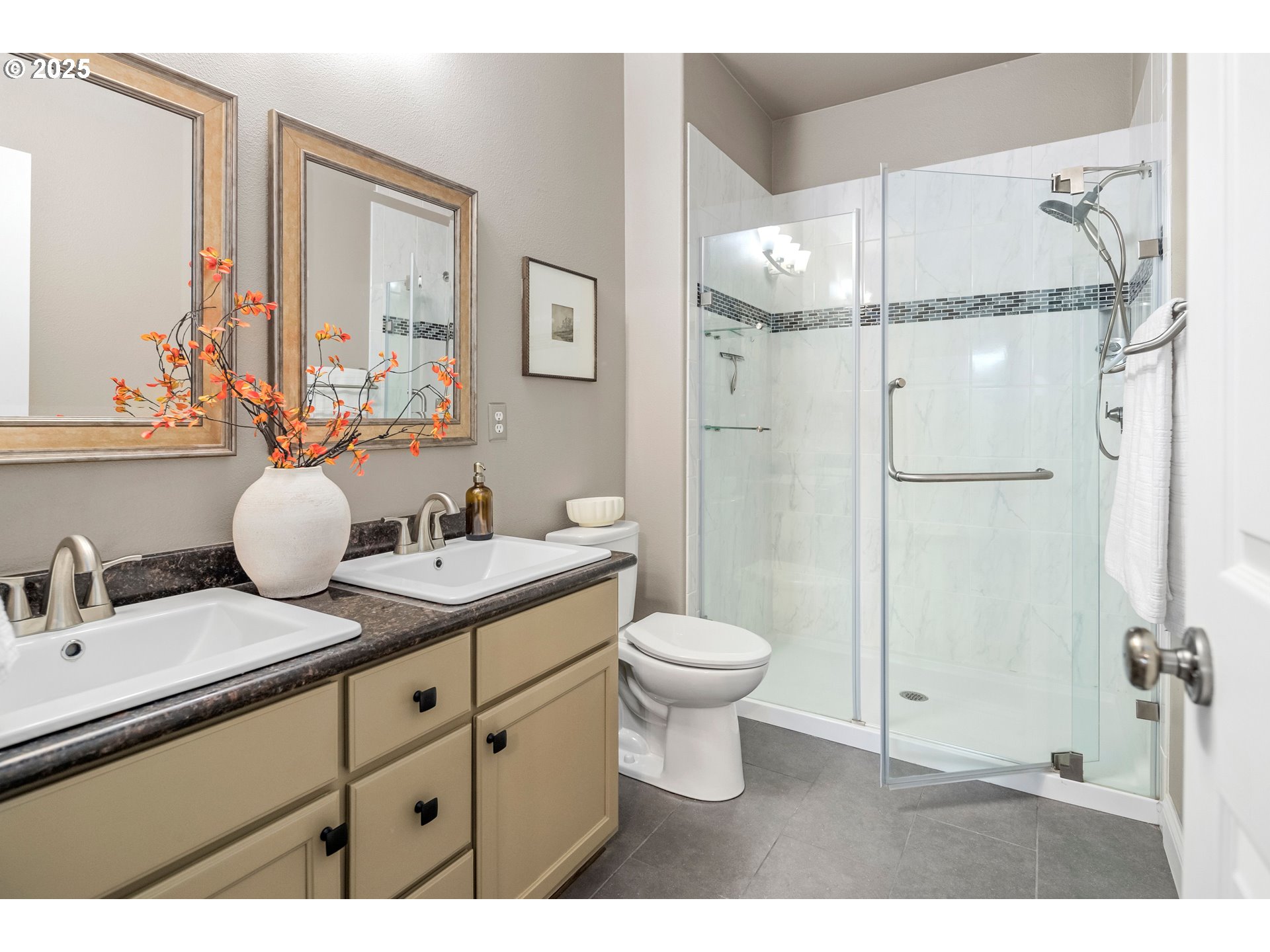 975 Springtree Lane West Linn, OR 97068 - Photo 24 of 48 a bathroom with a granite countertop sink toilet a mirror and shower