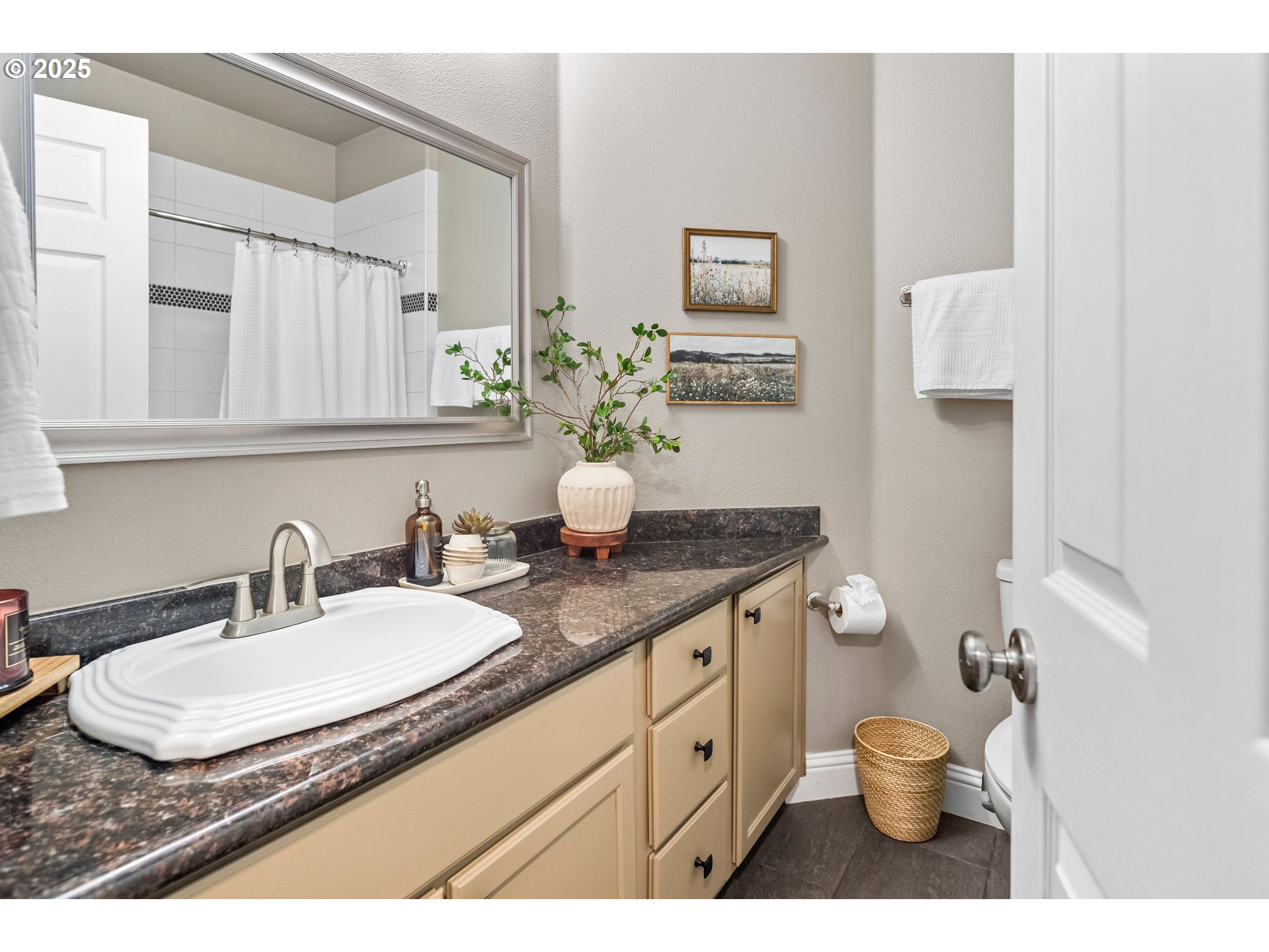 975 Springtree Lane West Linn, OR 97068 - Photo 33 of 48 a bathroom with a granite countertop sink a toilet and a mirror