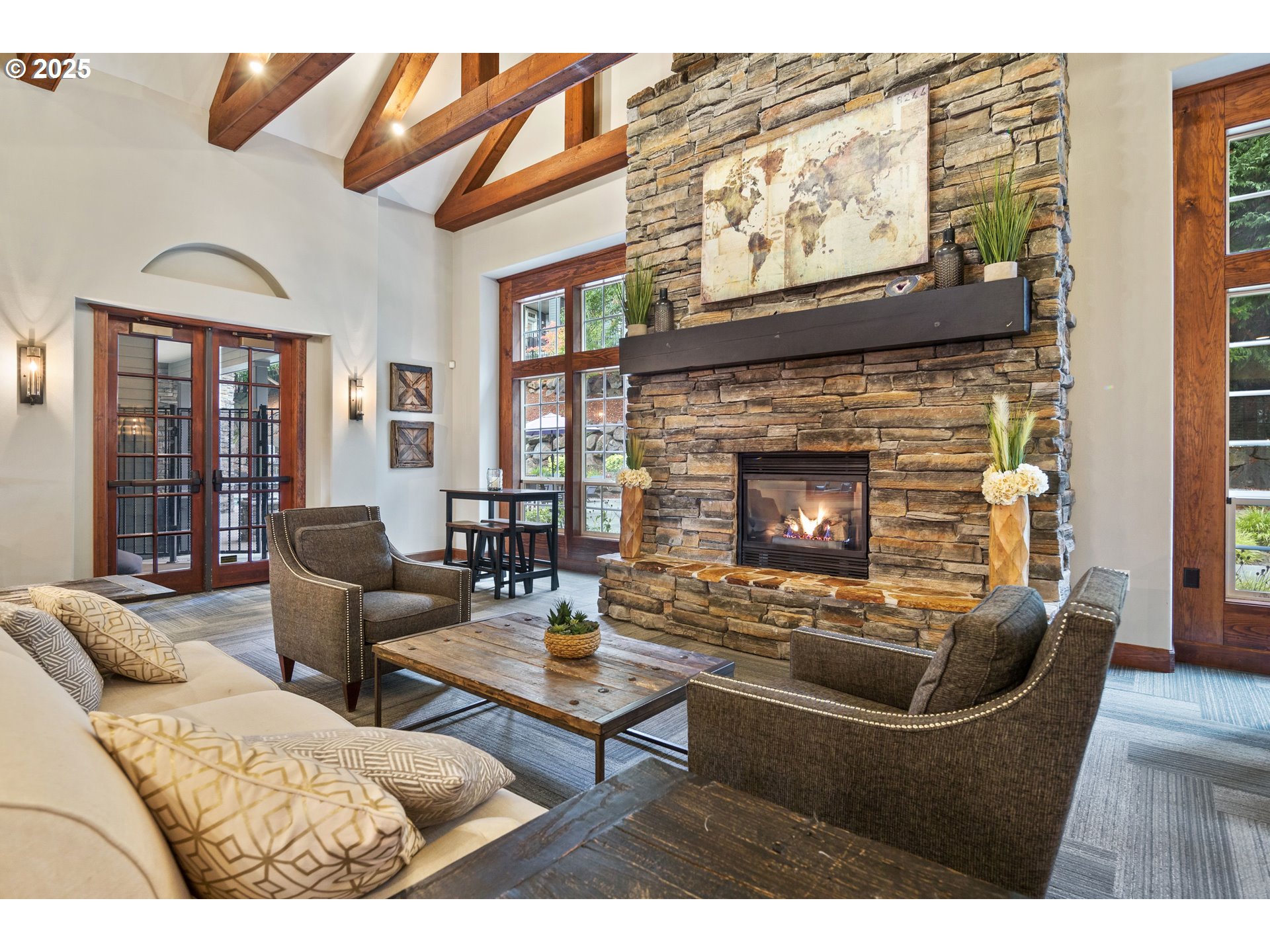 975 Springtree Lane West Linn, OR 97068 - Photo 40 of 48 a living room with furniture a wooden floor and a fireplace