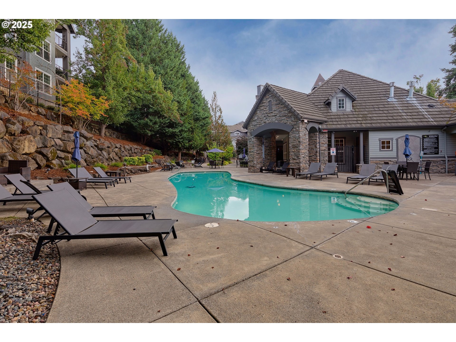 975 Springtree Lane West Linn, OR 97068 - Photo 46 of 48 a front view of a house with garden