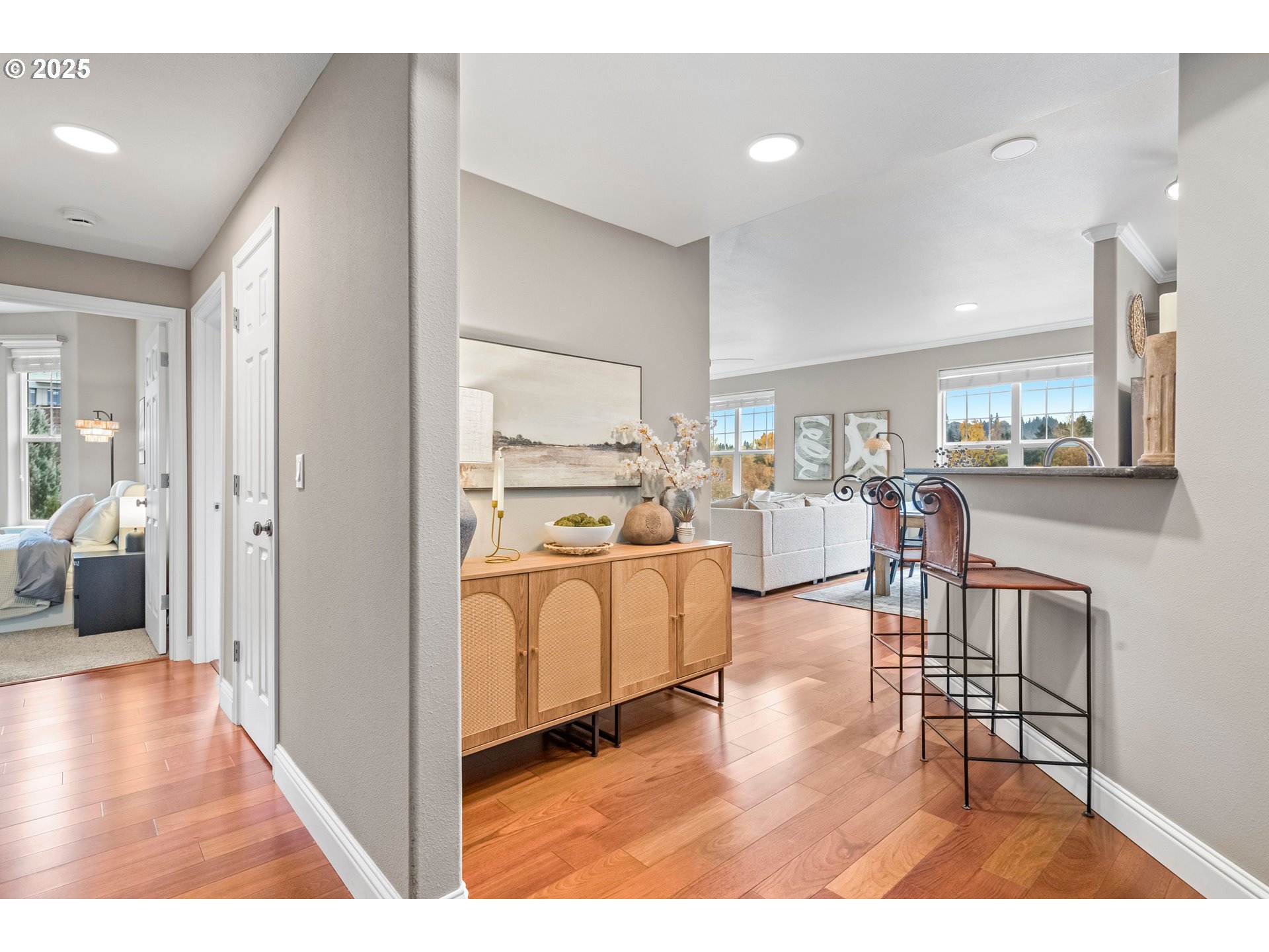 975 Springtree Lane West Linn, OR 97068 - Photo 9 of 48 a view of a living room kitchen and a wooden floor
