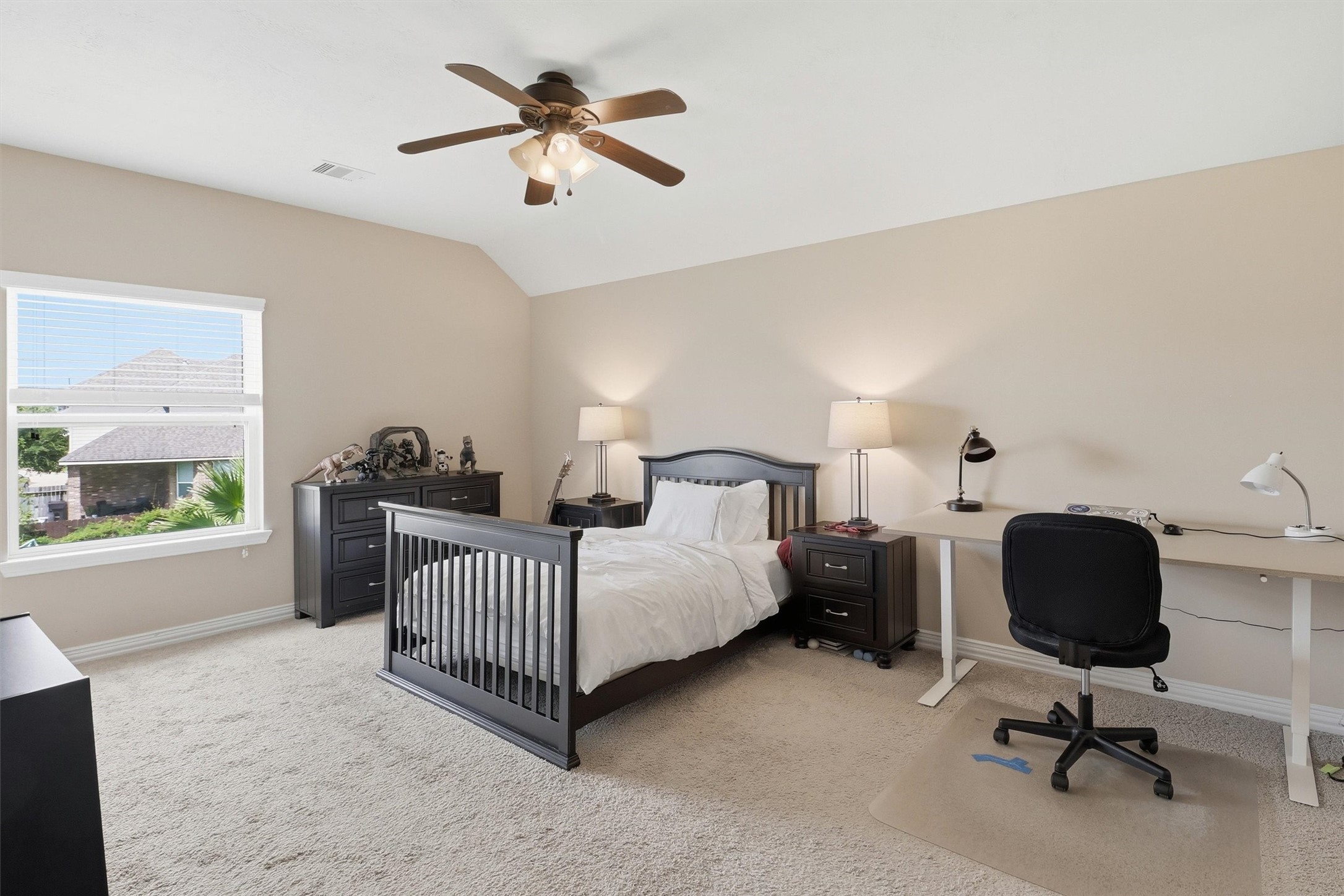 3219 Cotton Ranch Drive Katy, TX 77494 - Photo 33 of 45 This spacious secondary bedroom features plush carpeting, abundant natural light, and plenty of room for a full bedroom suite or study area.