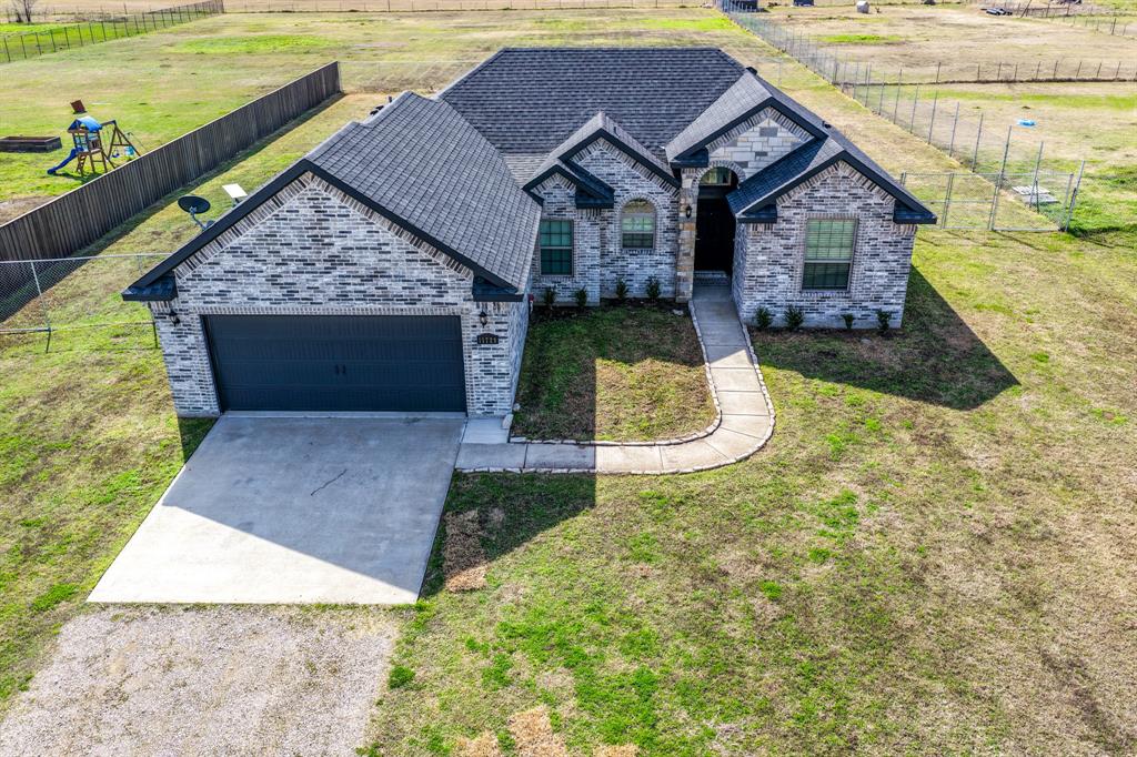 11729 County Road 313 Terrell, TX 75161 - Photo 23 of 25 a view of a house with a yard and ocean view