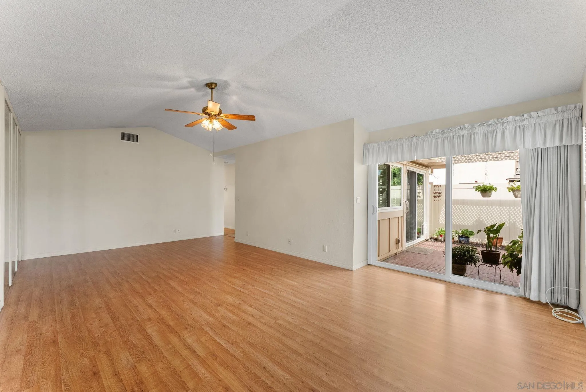 10357 Bart Way Santee, CA 92071 - Photo 12 of 39 a view of an empty room and window