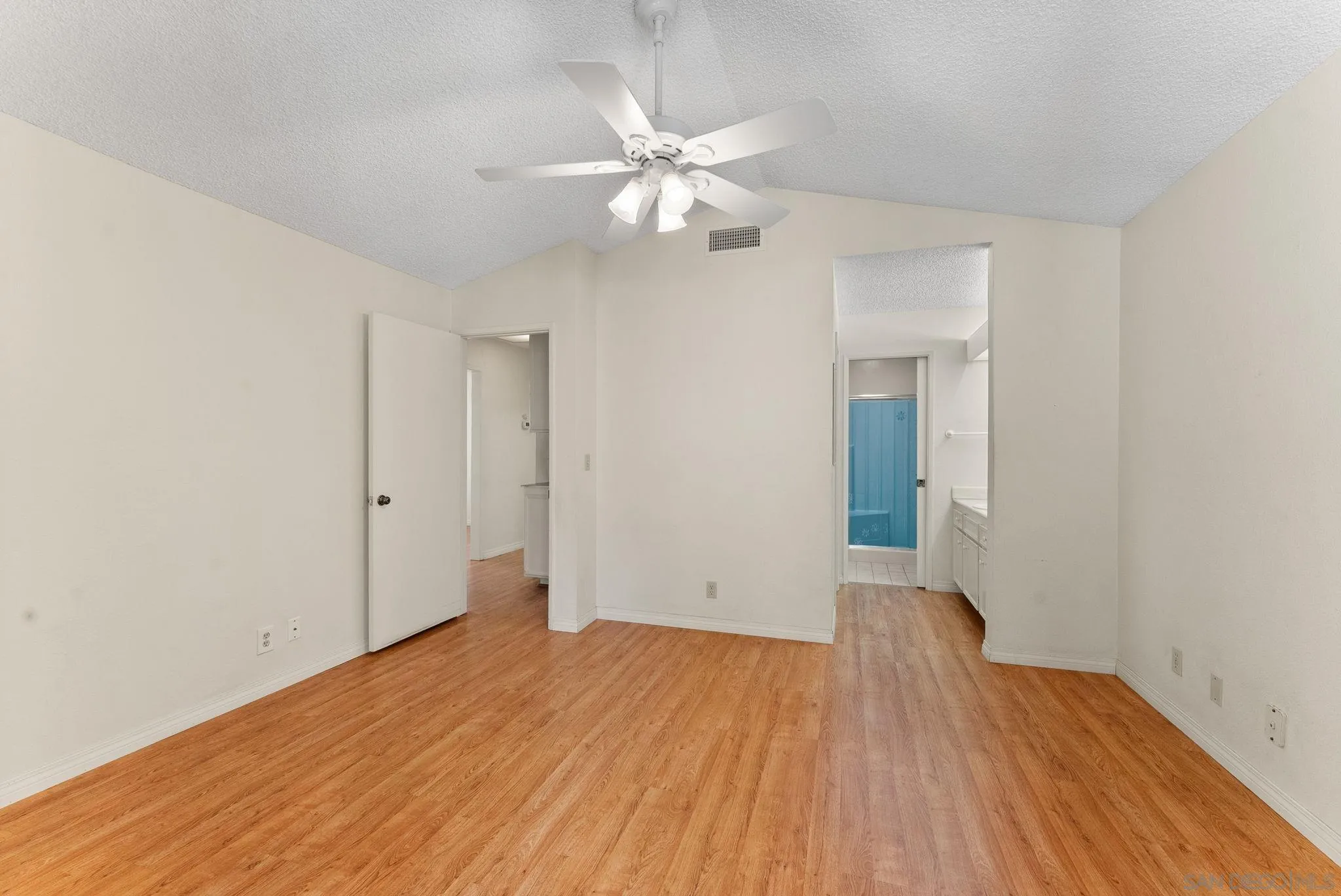 10357 Bart Way Santee, CA 92071 - Photo 17 of 39 a view of an empty room with wooden floor