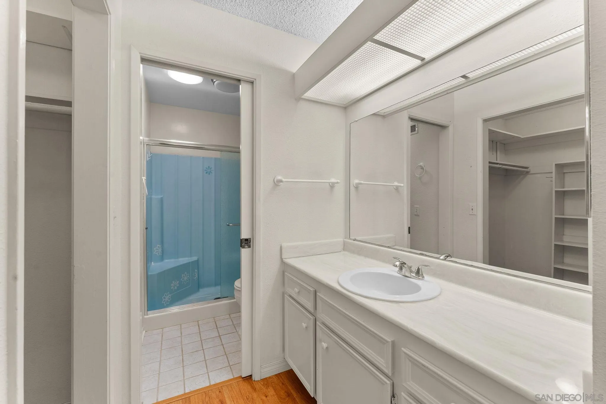 10357 Bart Way Santee, CA 92071 - Photo 22 of 39 a bathroom with a sink and a mirror