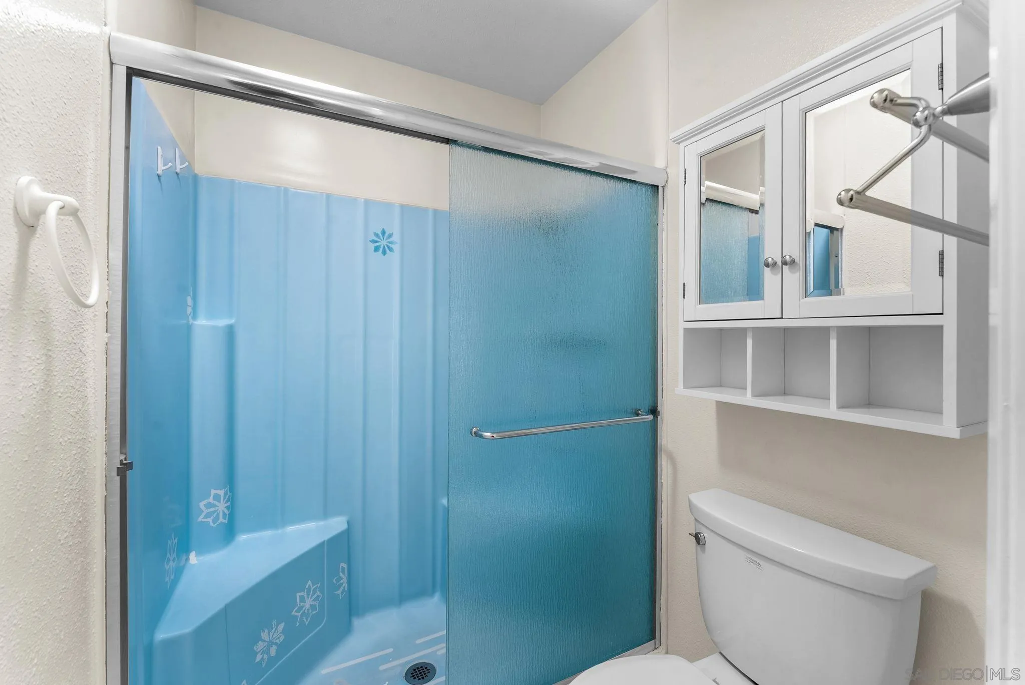 10357 Bart Way Santee, CA 92071 - Photo 23 of 39 a bathroom with a shower and a toilet