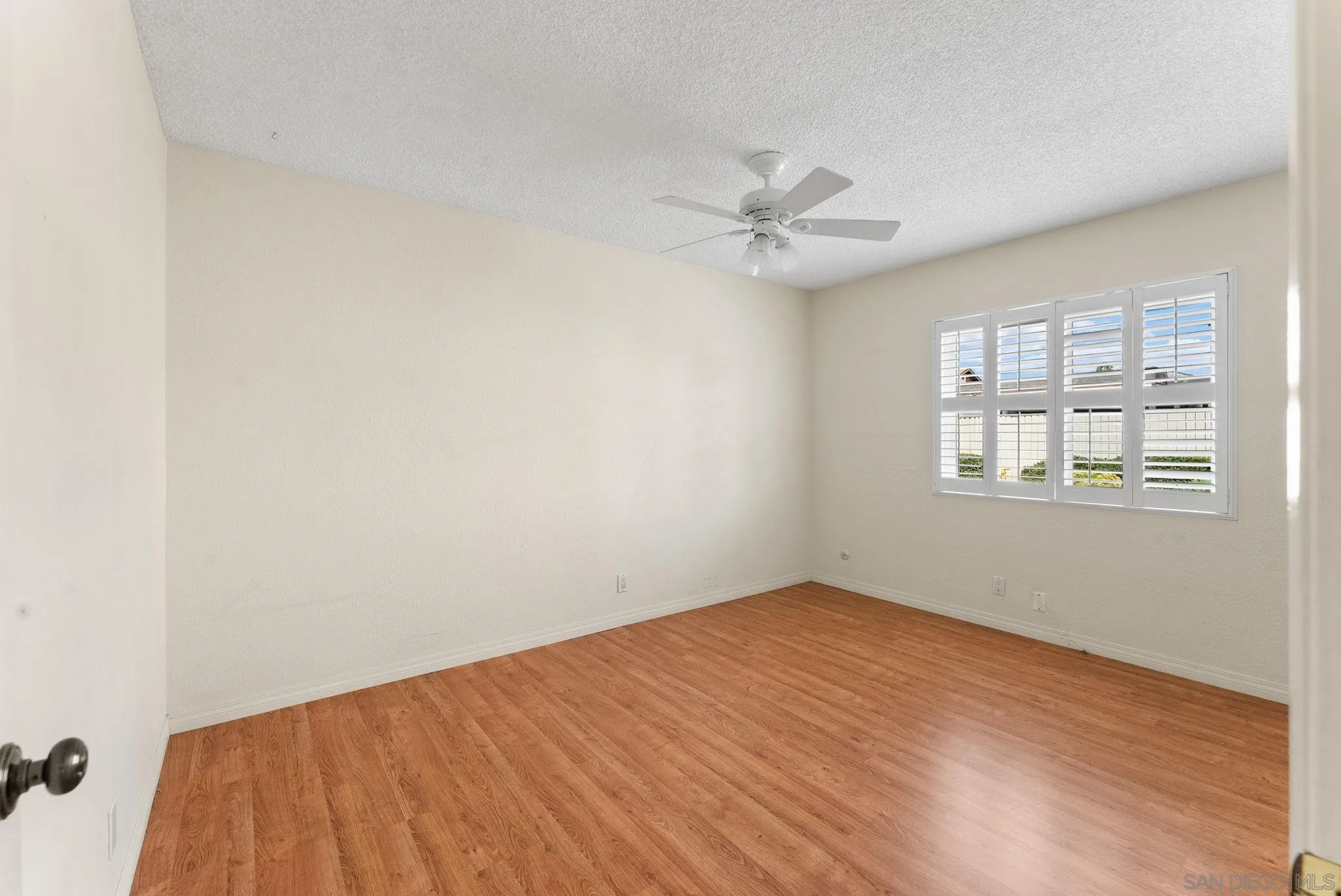 10357 Bart Way Santee, CA 92071 - Photo 25 of 39 wooden floor in an empty room with a window
