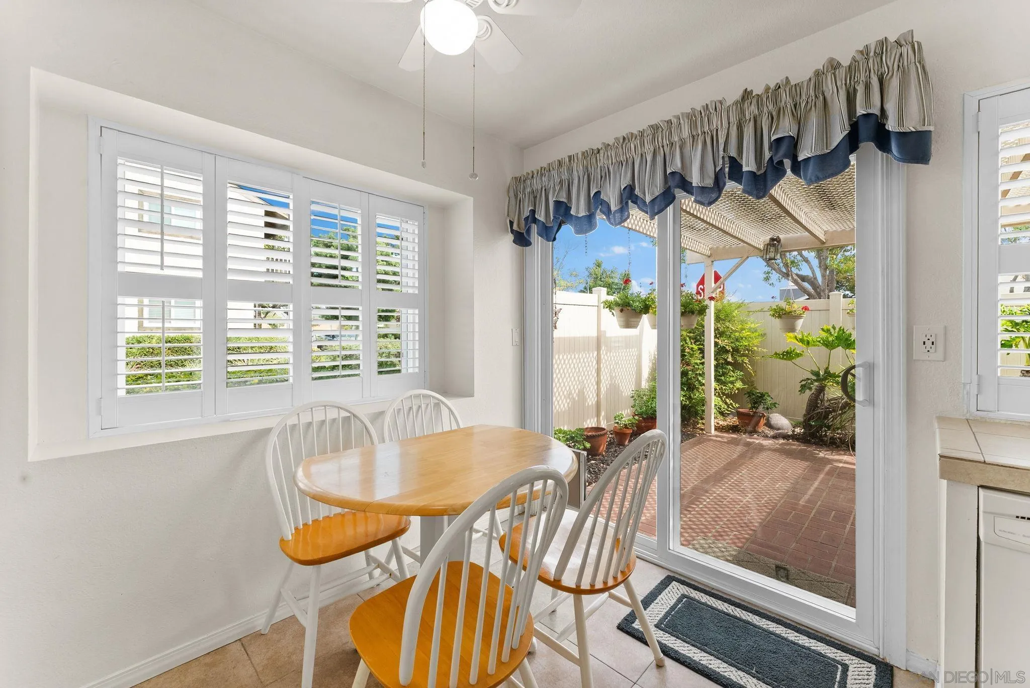 10357 Bart Way Santee, CA 92071 - Photo 6 of 39 a view of a dining room with furniture window and outside view