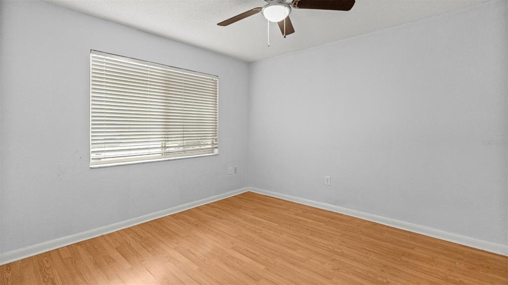 501 Southwest 75th Street, Unit B5 Gainesville, FL 32607 - Photo 27 of 38 an empty room with a window