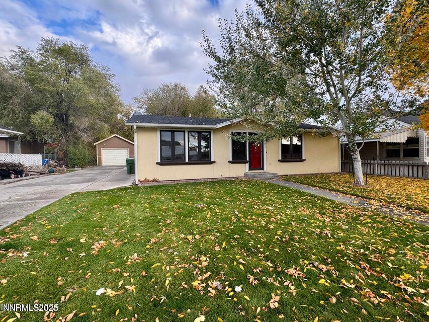 121 West Shepard Street Winnemucca, NV 89445 - Photo 1 of 14 front view of a house with a big yard