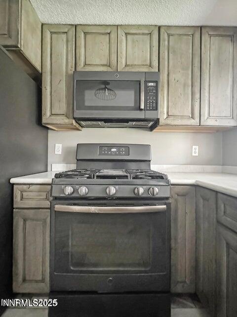121 West Shepard Street Winnemucca, NV 89445 - Photo 10 of 14 a stove top oven sitting inside of a kitchen
