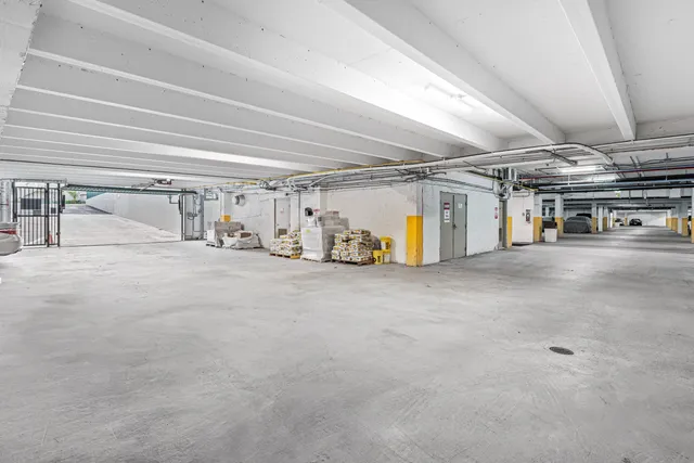 a view of a garage with of a car