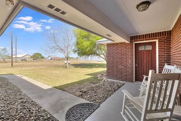 a view of swimming pool from a balcony