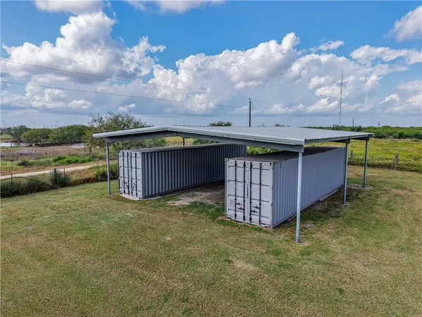 a view of a backyard with a tub