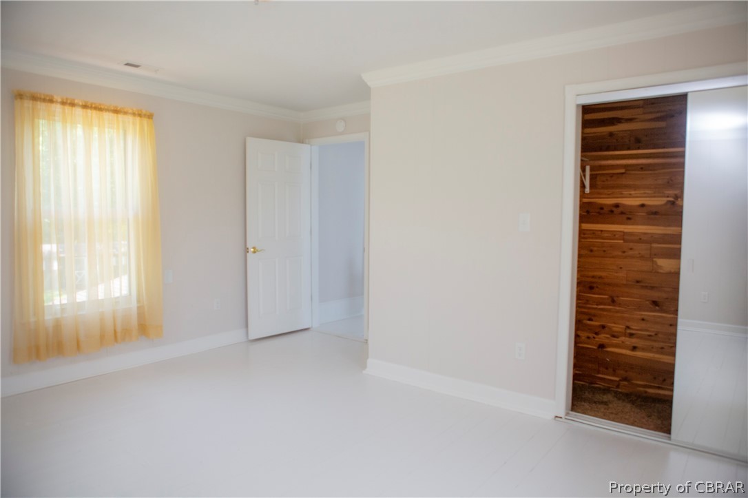 8669 Guinea Road Hayes, VA 23072 - Photo 46 of 49 Additional Upstairs Bedroom with cedar lined closet