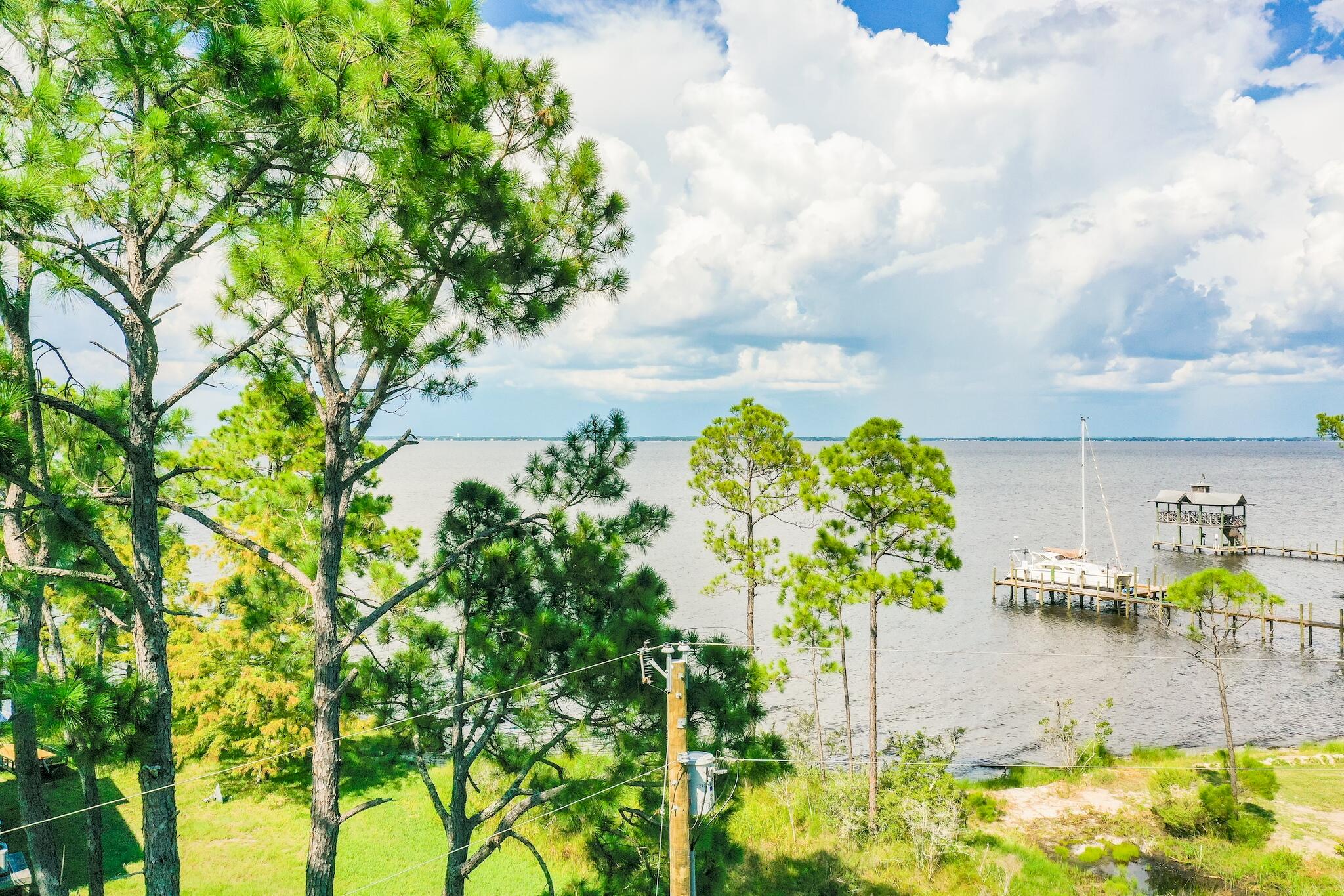 Lot 4 Whisper Lane Santa Rosa Beach, FL 32459 - Photo 1 of 16 a view of a garden
