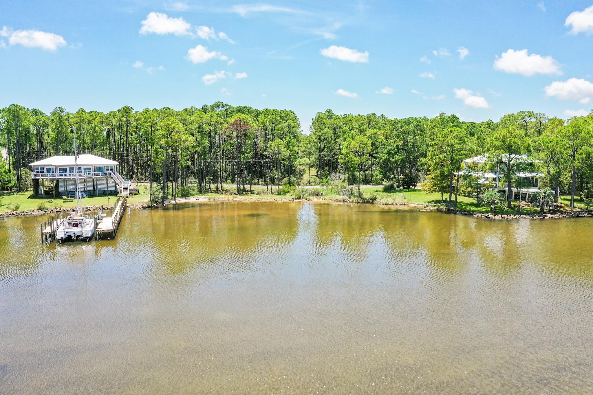 Lot 4 Whisper Lane Santa Rosa Beach, FL 32459 - Photo 15 of 16 a view of a lake and outdoor space